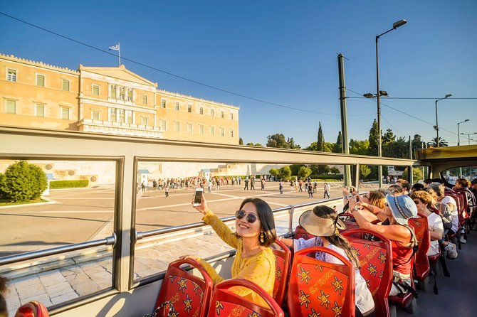 Athens Shore Excursion: Athens and Piraeus Hop-On Hop-Off Bus Tour - Audio commentary, seating, and what the ride feels like