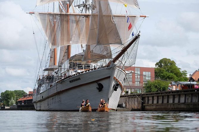 Cedar canoe tour in Klaipeda - ideal for Cruise Ship travelers. - The Meridian and Klaipeda’s postwar maritime story