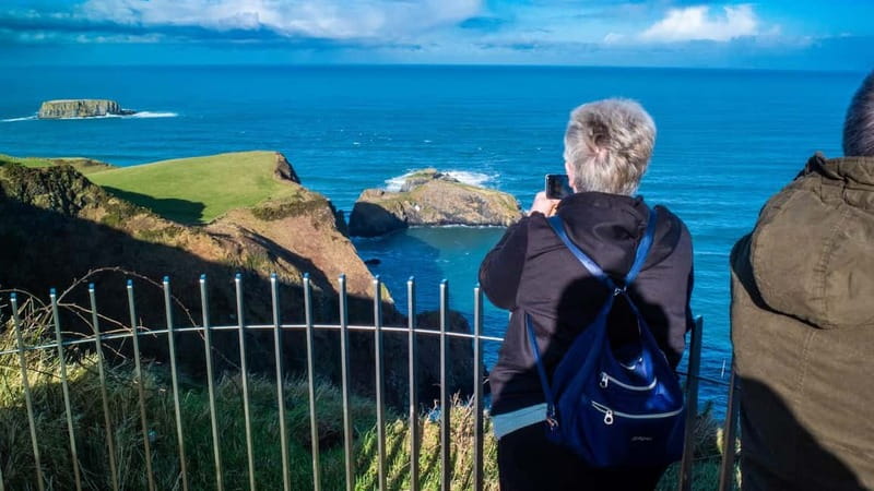 From Belfast: Full-Day Giant's Causeway Shore Excursion - Dunluce Castle: a quick coastal photograph