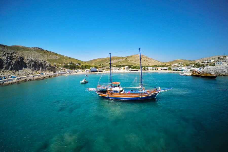 From the Port of Kos: Full Day Boat Cruise to 3 Islands - Dolphin spotting near the fish farms