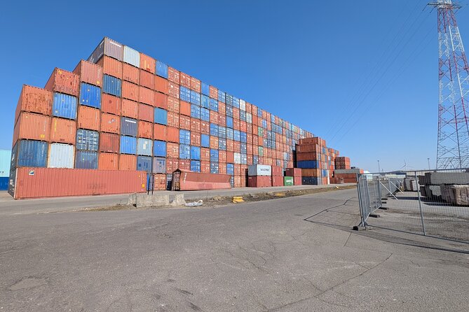 Guided Antwerp Port Tour, in your Car or Minibus - Lillo windmill and the cost of port expansion