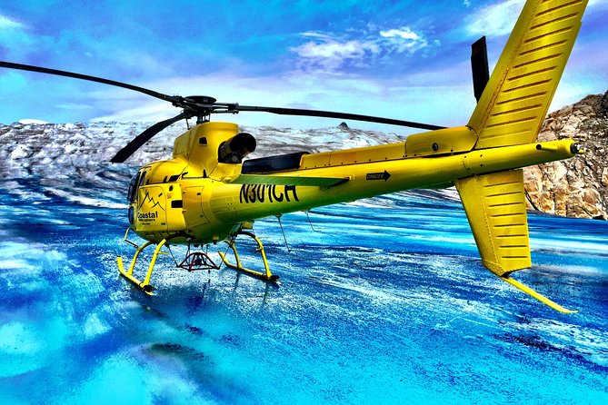Helicopter to a Dogsledding Experience with a Glacier Landing - Price and value at $860.52 per person