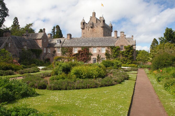 Invergordon Shore Excursion: Inverness, Cawdor Castle & Whisky - Dores Beach: a quick Loch Ness look