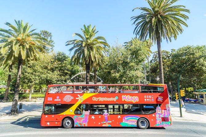 Malaga Shore Excursion: City Sightseeing Malaga Hop-On Hop-Off Bus Tour - The guided walk fills in what the bus cannot show