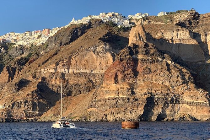 Private Luxury Santorini Catamaran Cruise with Port Pickup - Daylight sailing or a Santorini sunset